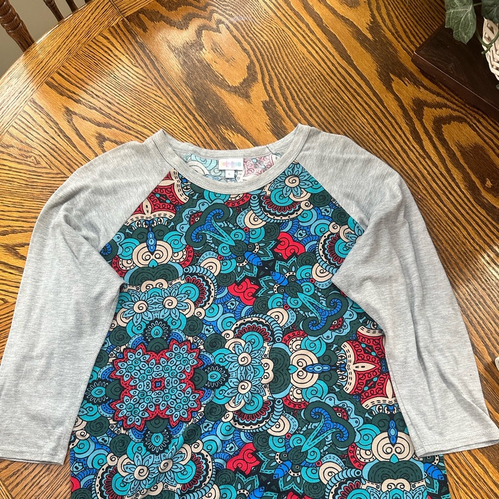 Lularoe Top with Gray Sleeves and paisley print in multi color.